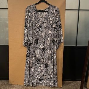 Crème and white long sleeve dress. Also the dress is long itself.